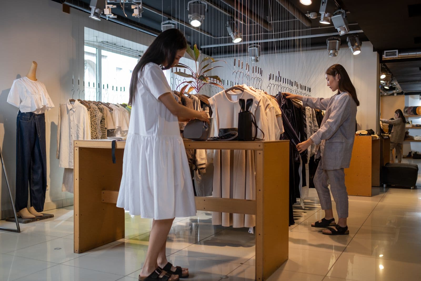 Clothes hanging in a store